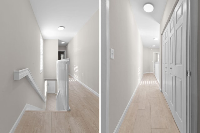 hallway with light hardwood / wood-style floors