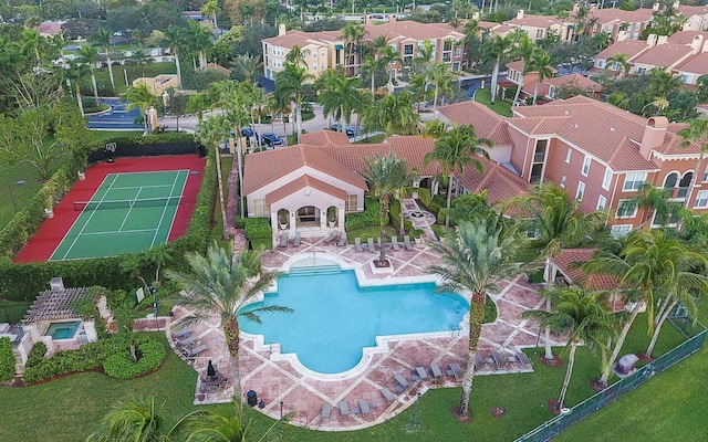 view of pool featuring tennis court