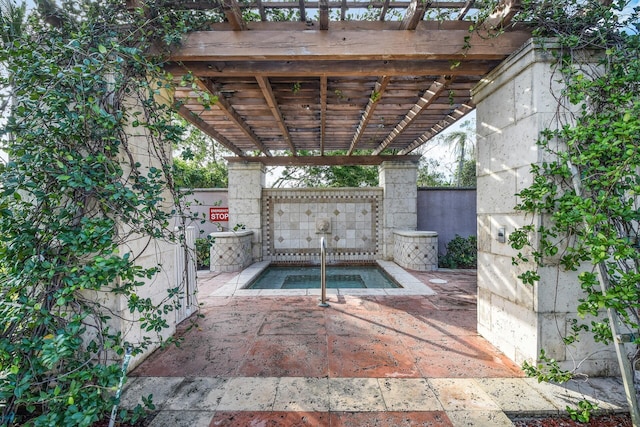 view of swimming pool with a pergola, an in ground hot tub, and a patio