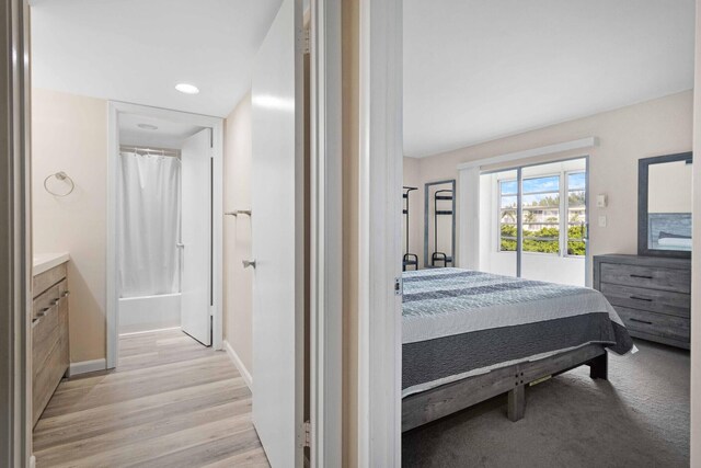 bedroom with light wood-type flooring