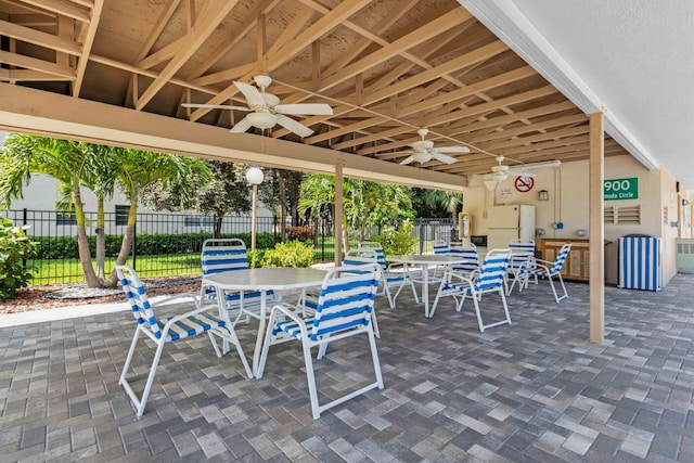 view of patio featuring ceiling fan