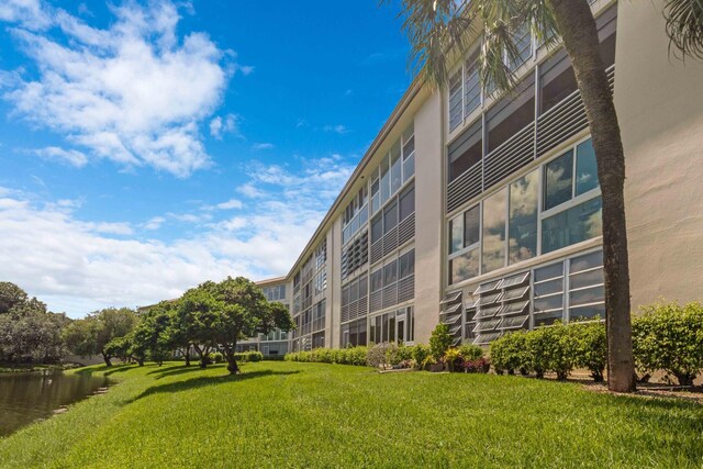 view of building exterior with a water view