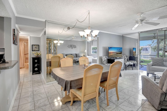 dining room with a textured ceiling, ceiling fan with notable chandelier, and ornamental molding