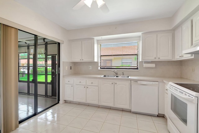 kitchen featuring white appliances, sink, ceiling fan, and white cabinets