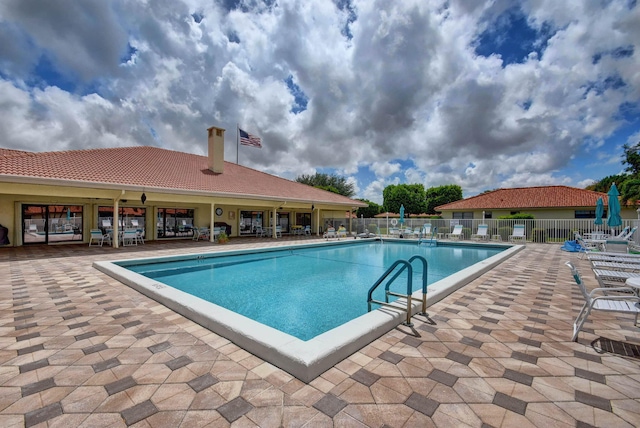 view of pool featuring a patio area