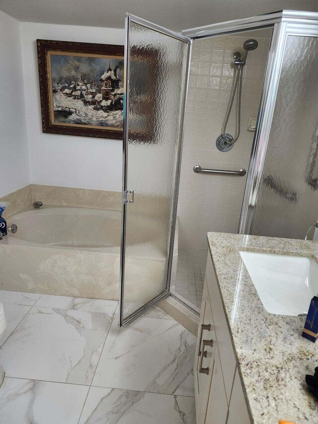 bathroom with vanity and plus walk in shower