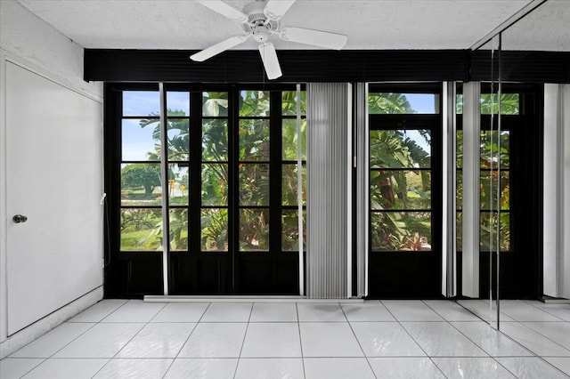 interior space featuring ceiling fan