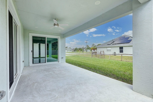 view of patio with ceiling fan