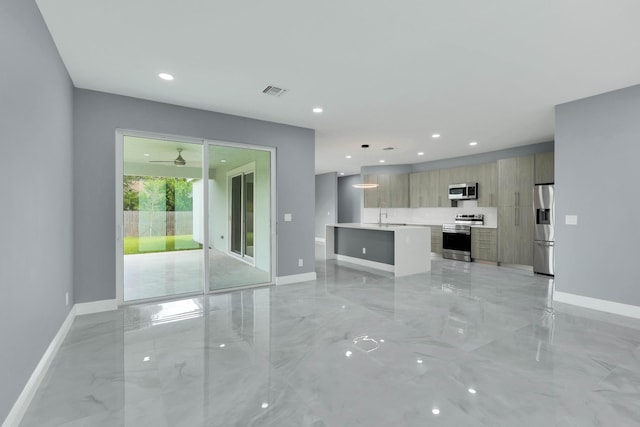 1749 SW California Blvd, Port Saint Lucie, FL 34953 - unfurnished living room with light marble finish floors, baseboards, recessed lighting, ceiling fan, and a sink