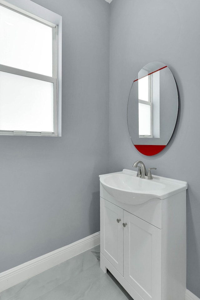 bathroom featuring vanity and plenty of natural light