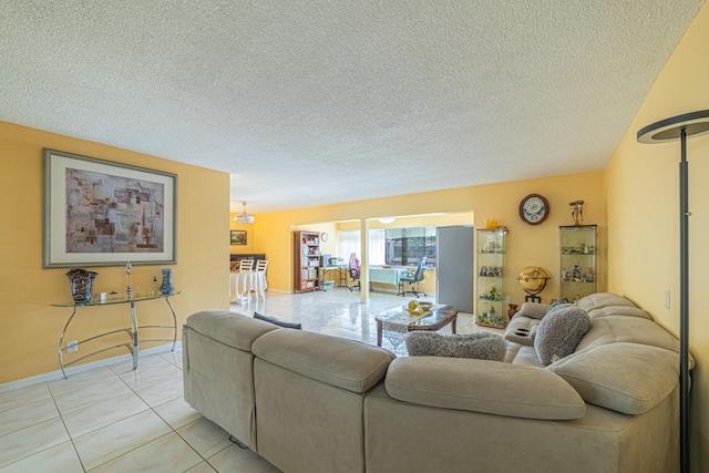 tiled living room with a textured ceiling