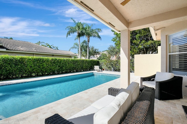 view of pool featuring an outdoor hangout area and a patio area