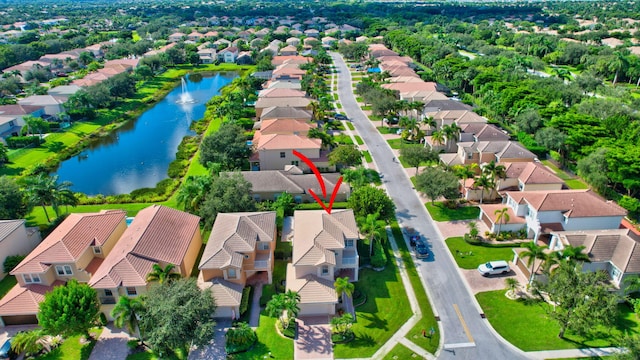 drone / aerial view featuring a water view