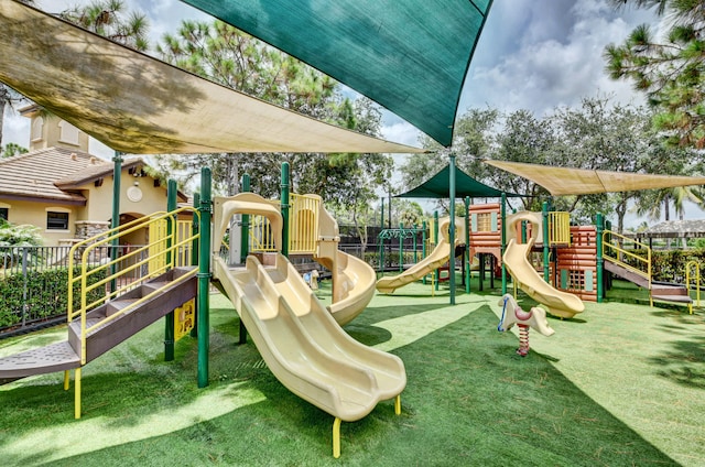 view of playground with a yard