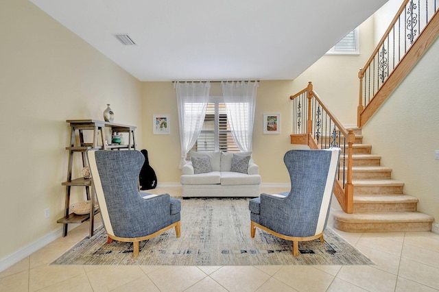 living room with light tile patterned flooring