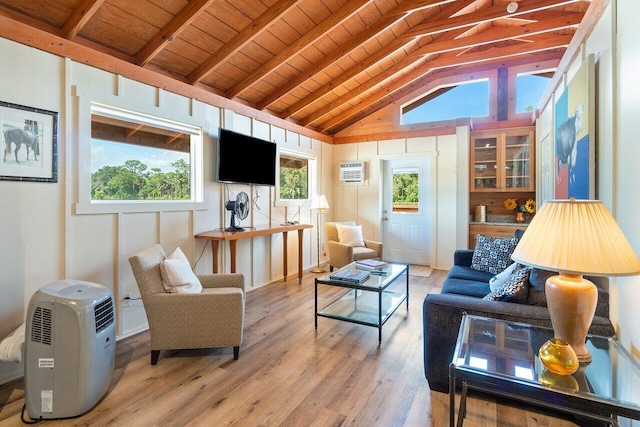 living room with an AC wall unit, light wood-type flooring, vaulted ceiling with beams, and wooden ceiling