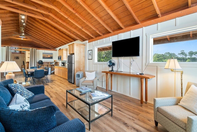 living room with wooden ceiling, vaulted ceiling with beams, ceiling fan, and light hardwood / wood-style flooring