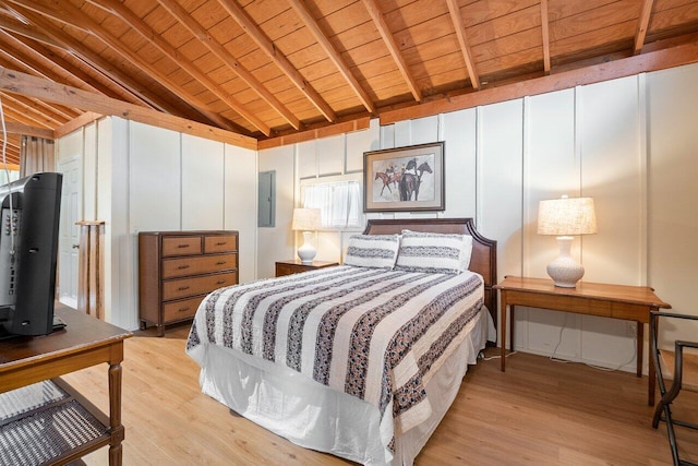 bedroom featuring vaulted ceiling with beams, electric panel, wood ceiling, and light hardwood / wood-style flooring