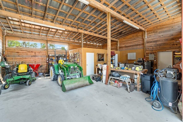 garage with wood walls