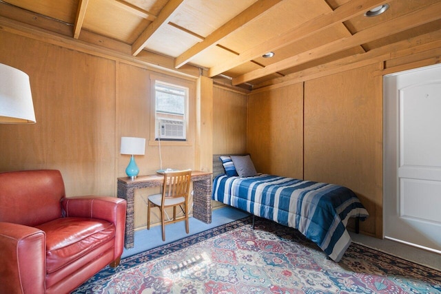 bedroom featuring cooling unit and wooden walls