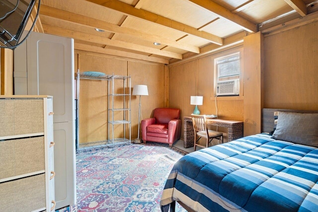 bedroom featuring cooling unit and wooden walls