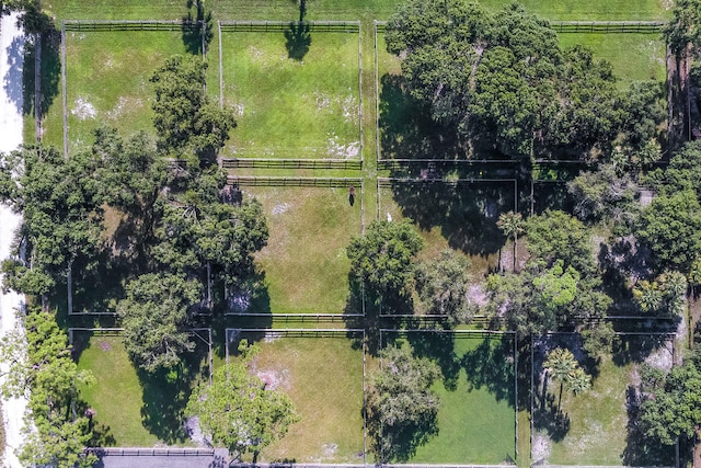 birds eye view of property featuring a rural view