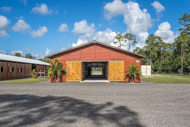 garage with wood walls