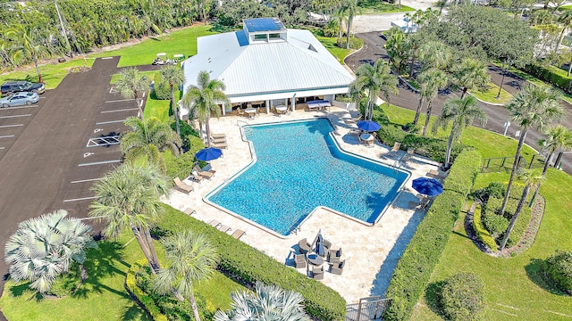 view of swimming pool with a patio