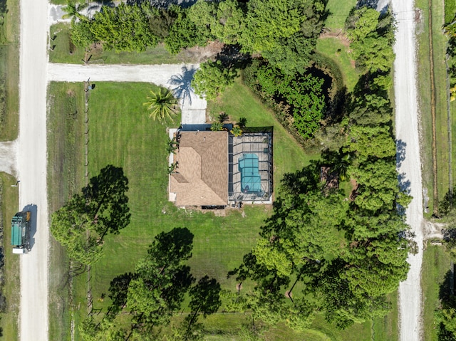 birds eye view of property with a rural view