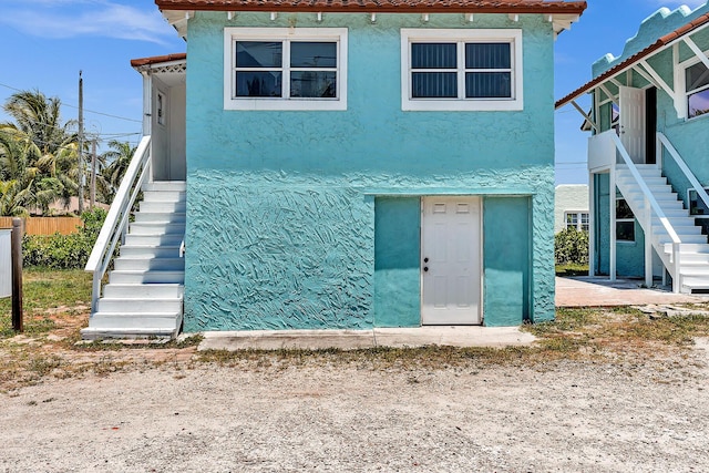 back of property featuring a patio