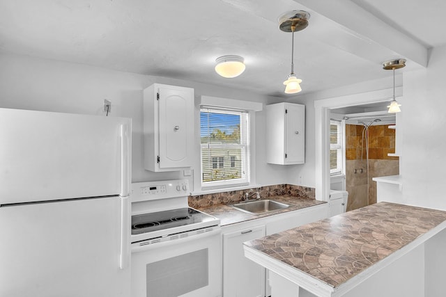 kitchen featuring white cabinets, white appliances, sink, and hanging light fixtures