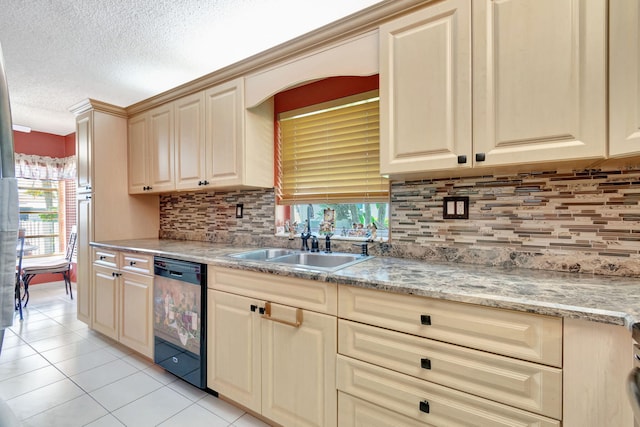 kitchen featuring backsplash, black dishwasher, light tile patterned floors, a textured ceiling, and sink