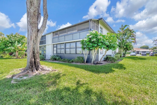 exterior space featuring a lawn