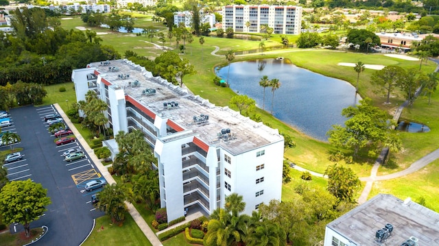 aerial view with view of golf course and a water view