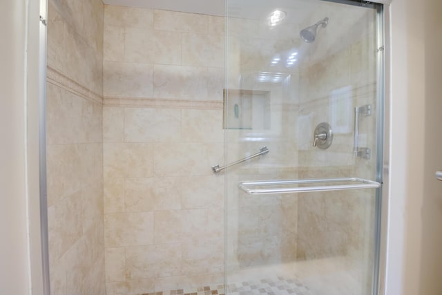 bathroom featuring a stall shower
