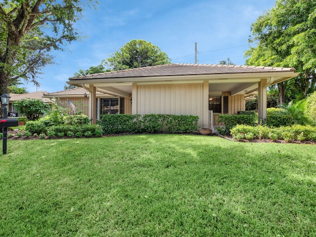 exterior space with a front yard