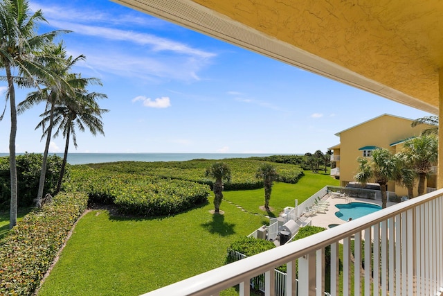 balcony featuring a water view