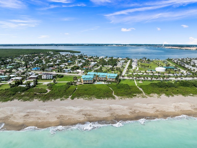 aerial view with a beach view and a water view