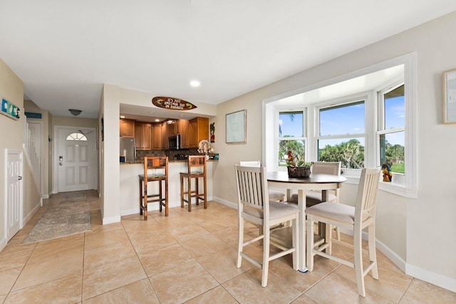 view of tiled dining space