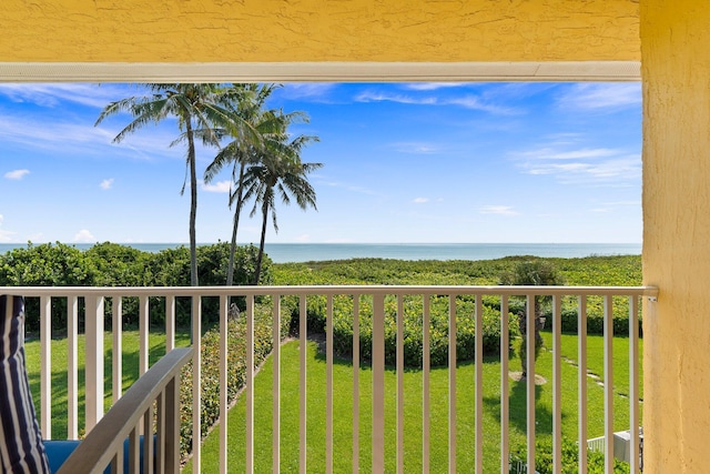 balcony featuring a water view