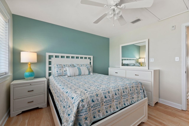 bedroom featuring ceiling fan and light hardwood / wood-style flooring