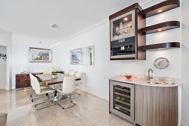 dining room with beverage cooler, indoor wet bar, crown molding, lofted ceiling, and a textured ceiling