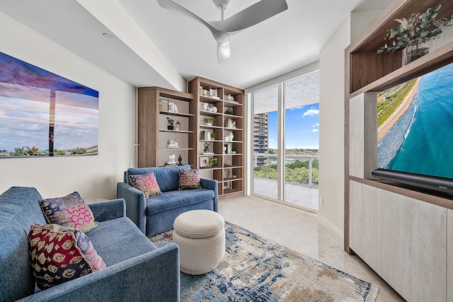 living room with ceiling fan