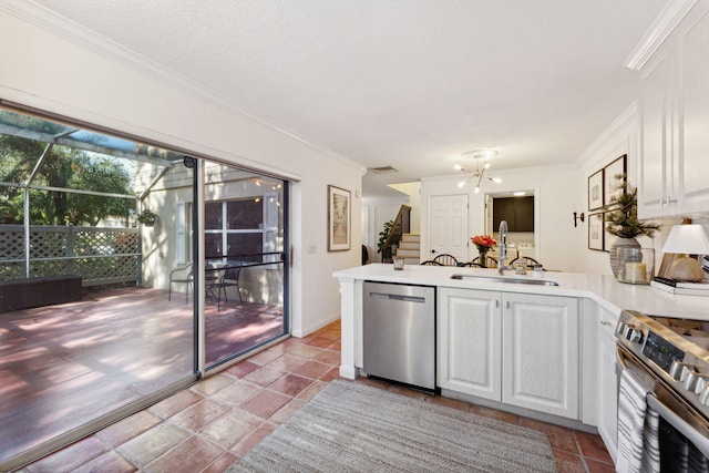 kitchen featuring white cabinetry, kitchen peninsula, appliances with stainless steel finishes, and sink