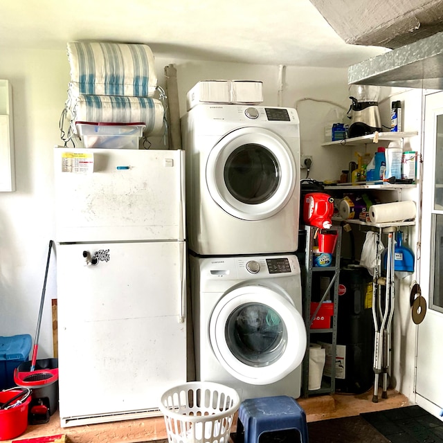 laundry room featuring stacked washer and dryer