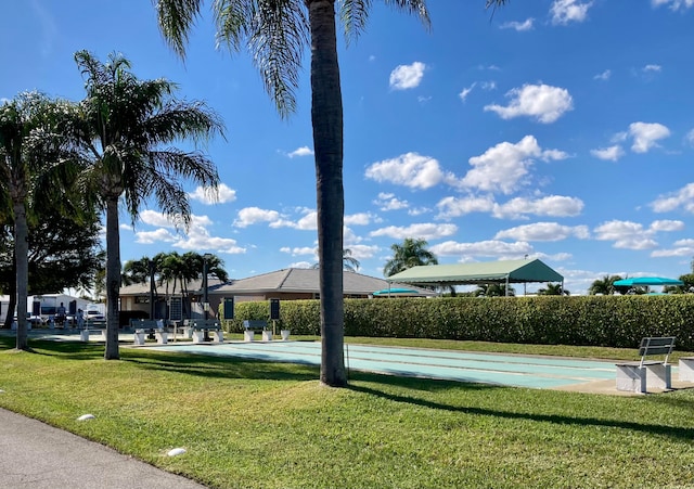 view of community featuring a lawn