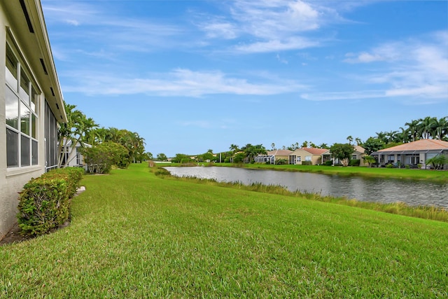 9772 Via Grandezza W, Wellington, FL 33411 - view of yard featuring a residential view and a water view