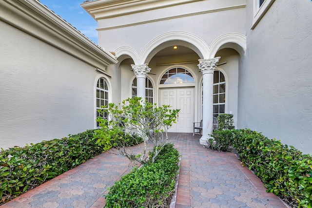9772 Via Grandezza W, Wellington, FL 33411 - entrance to property featuring stucco siding
