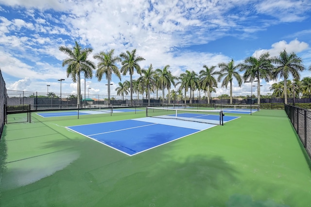 9772 Via Grandezza W, Wellington, FL 33411 - view of tennis court with fence and community basketball court