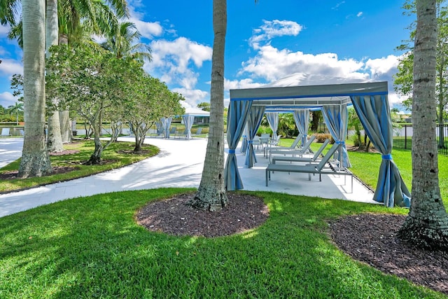 9772 Via Grandezza W, Wellington, FL 33411 - view of property's community with a lawn and a gazebo